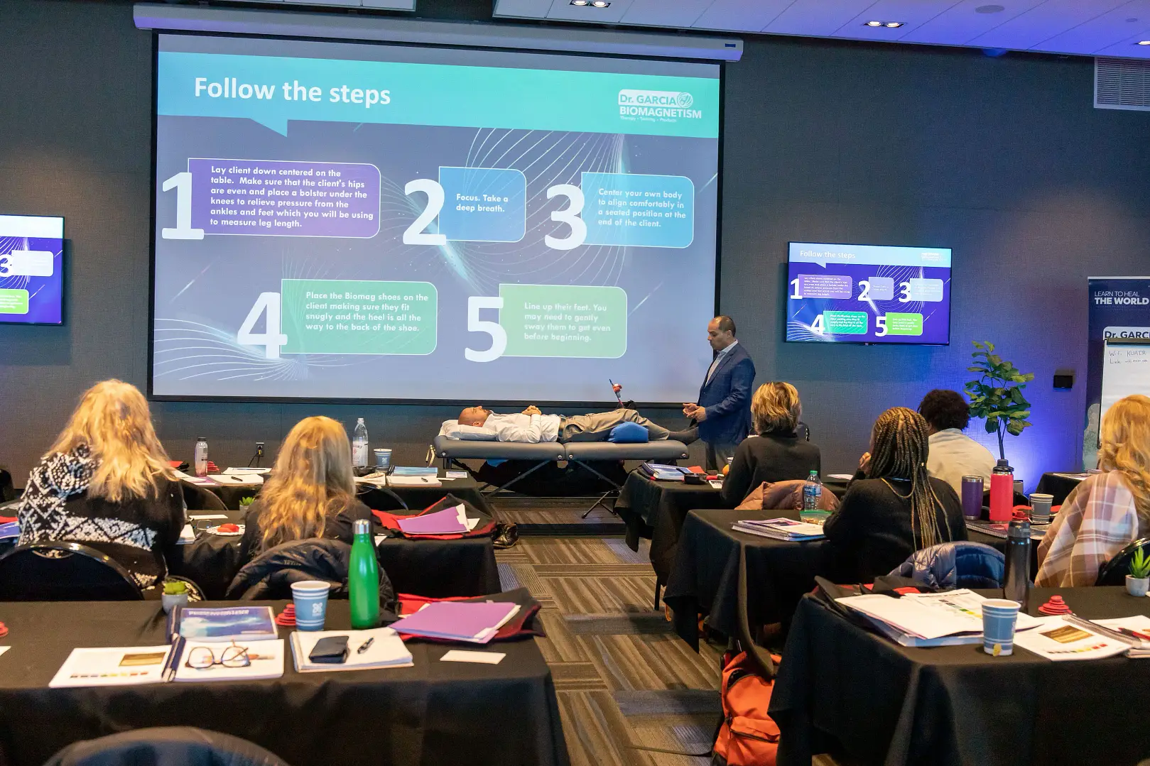 Students practicing muscle testing